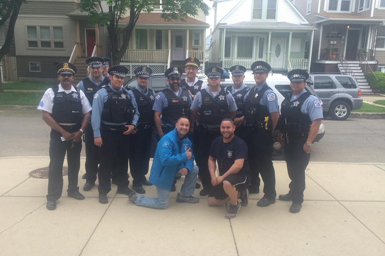 Group photo of Chicago police officers and two park staff