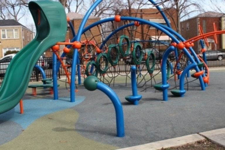 Colorful playground jungle gym with slide.