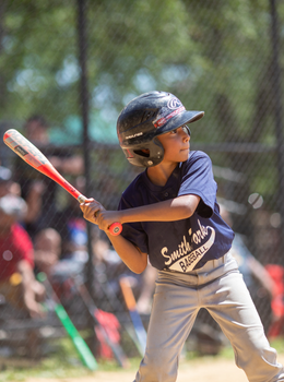 Young baseball player at bat.