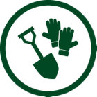 Gardening tools: shovel and gloves.