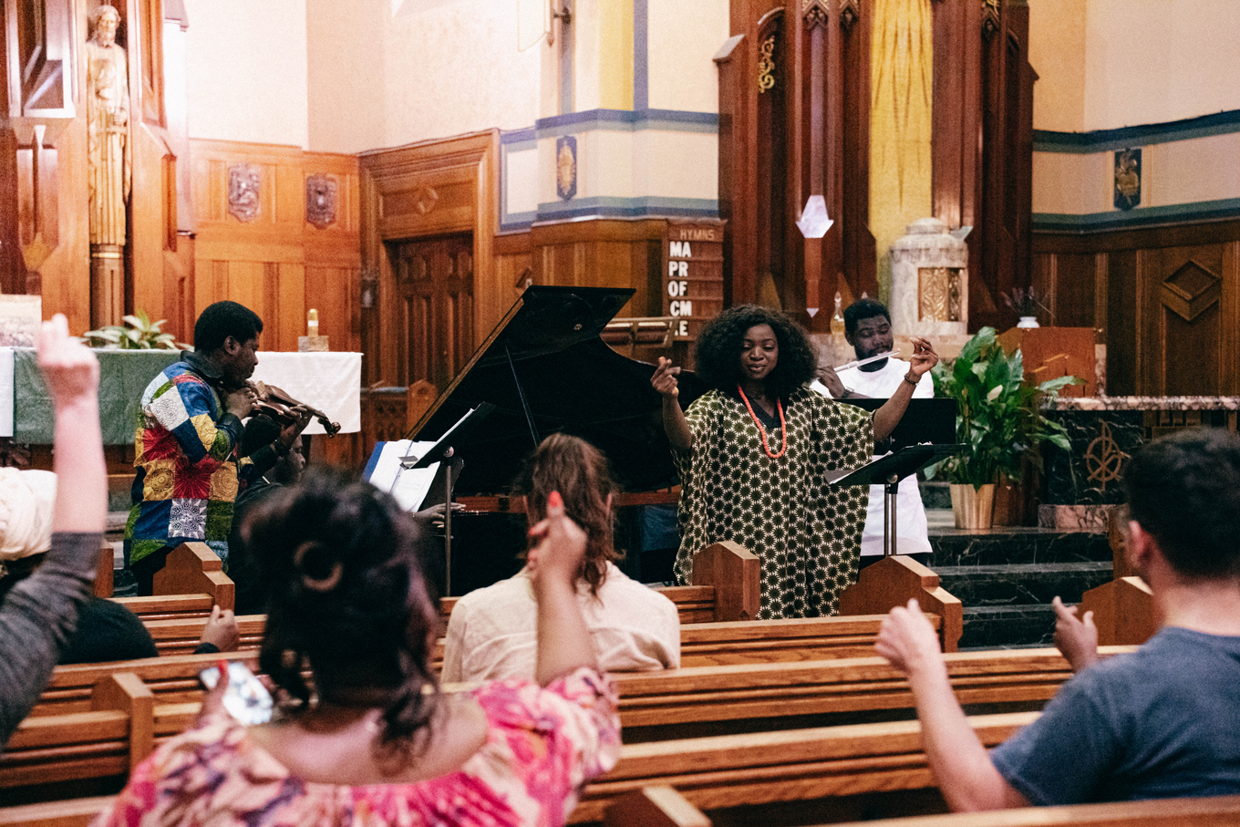 Musicians lead a church congregation in song.