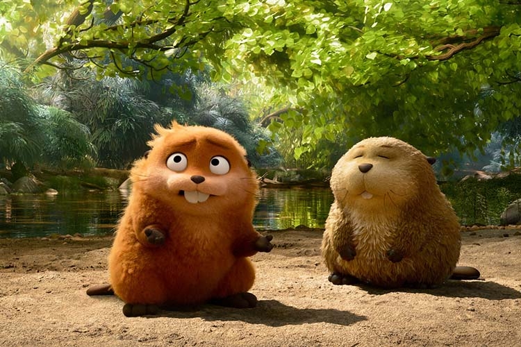 Two animated beavers sit on a sandy riverbank beneath lush, sunlit trees.