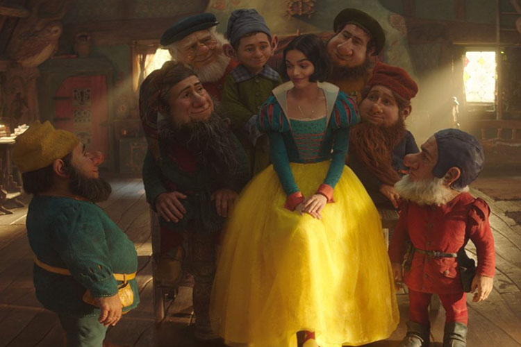 Snow White sits in a cozy wooden cottage surrounded by seven friendly, diverse dwarfs.