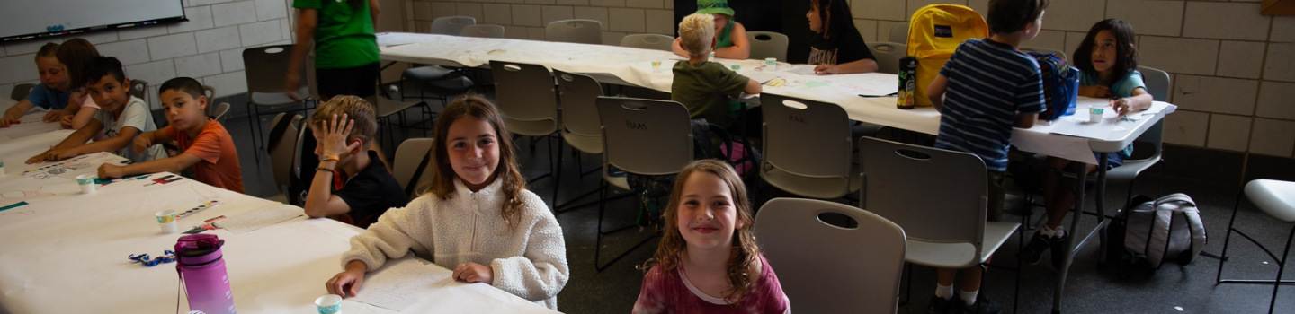 Meeting & Event Spaces.png Children sit at tables creating art projects.