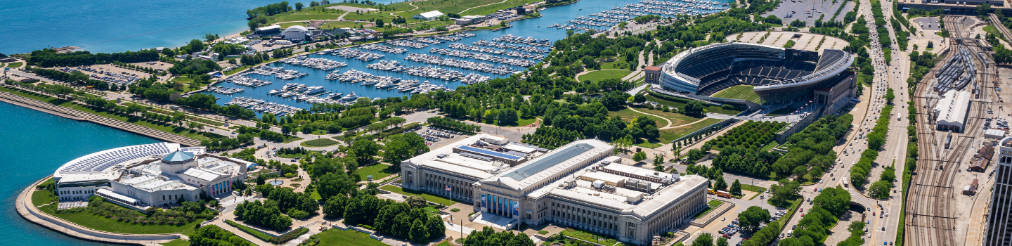 Aerial view of Chicago's Museum Campus, Soldier Field, and harbor.
