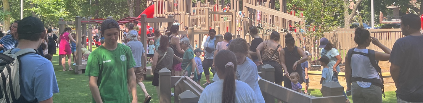 Crowded playground on a sunny day.
